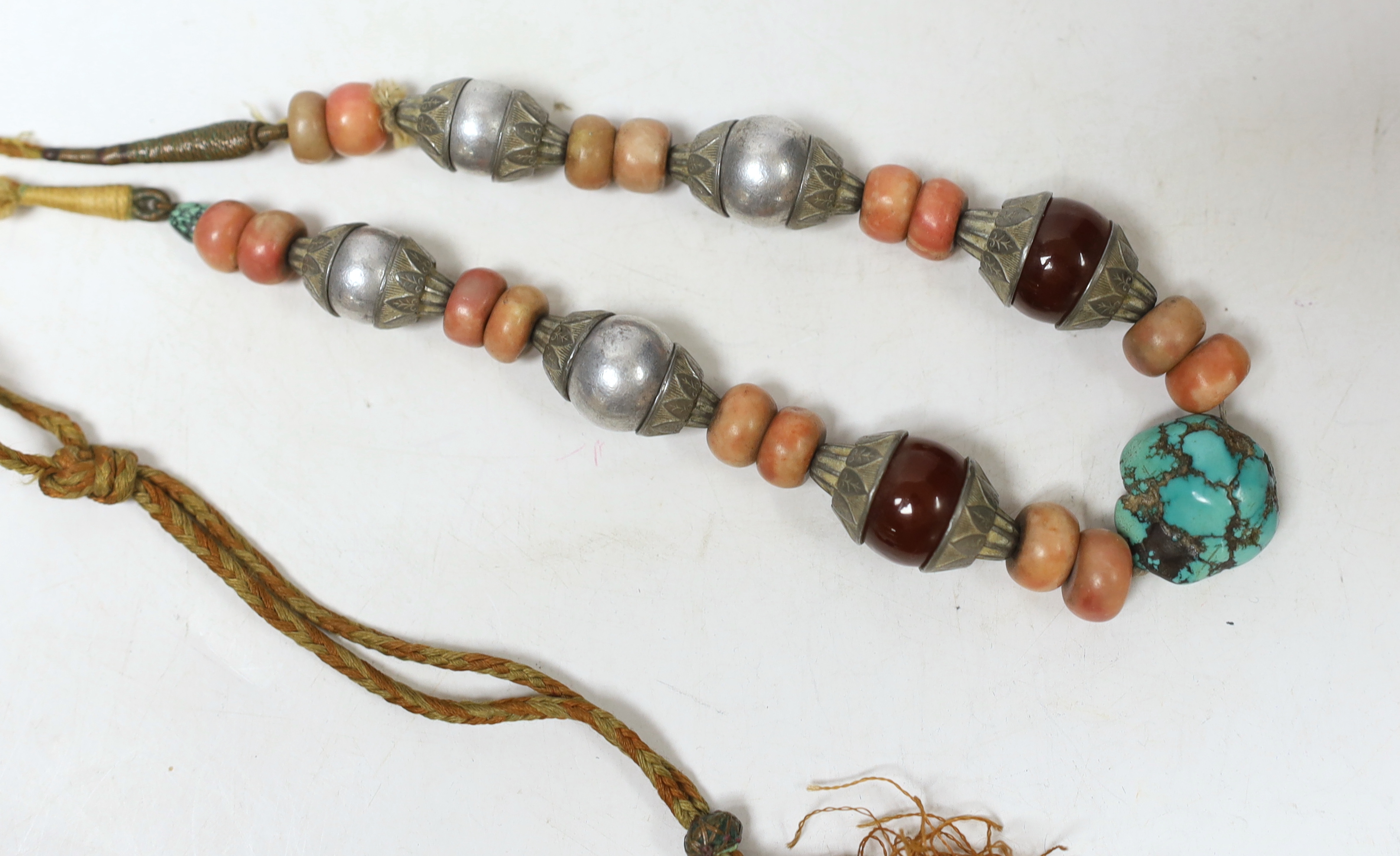 A Tibetan? white metal and multi bead set necklace, 54cm